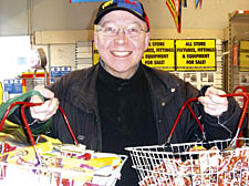 Stephen Burrows snaps up some bargain treats for his son's birthday party