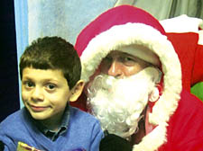 MP Jeremy Corbyn as Santa with six-year-old Jordan Darwish