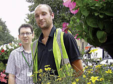 Steve Long on the left and Andrew Bedford of Islington&rsquo;s floral team admiring one of their award-winning hanging baskets