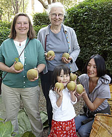 Residents, from left, Bridget Butt, Jane Howard, Poppy Schneck, 4, and her mother Michiko 