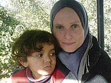 Jenny Linnell with a Palestinian child