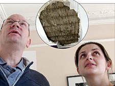 Lee and Martina Rickler inspect the damage to the ceiling in their lounge. Inset above, the damaged structure