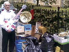 Leo Chapman with some of the items he has rescued from bins and skips, where they were destined for landfill