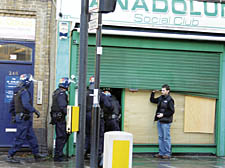 Police officers raid Anadolum in Hornsey Road on Tuesday afternoon