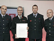 Holloway Red watch, from left: Alan Flynn, London Fire Commssioner Ron Dobson, Nicholas Thomas and Robert Summerfield 
