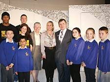 Debbie and George Kinsella with schoolchildren and actors from The Comedy School at Nailor Hall Community Centre 