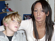 Heartbroken nine-year-old Bailey at home with mum Leyla