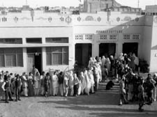 A group of mostly Muslim women queueing to vote in the first general election
