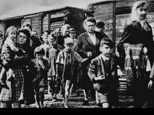   German families in the Sudetanland - part of Czechoslovakia annexed b y Hitler - wait for a train back to Germany 