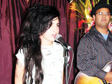 Amy Winehouse performing at Bar Solo