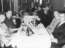 Sylvia Plath and Ted Hughes (left of table) returning to Britain on the SS United States in 1959