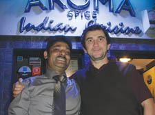 Phil Daniels (right) with Aroma Spice owner Moin Bakth