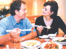 Cherie and Tony enjoying a Chinese takeaway