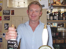 Henry Davies out from behind the scenes in the film world and enjoying a new life behind the bar