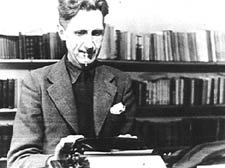 George Orwell: fag in mouth at his typewriter