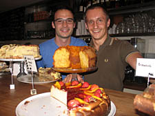 Pablo Casas with staff member Martin Olejinzack and some of Macondo's mouthwatering cakes