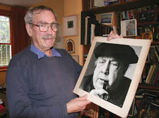 Tom Priestley with a photo of his father
