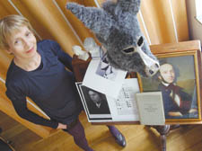 Shelia Hayman at her Camden Town home with portrait of Felix Mendelssohn 