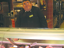 Budgens’ butcher Marco Amato and (inset) the cheese counter
