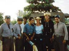 Nicola and her brother Kit in Cuba in 1960 with members of the local police 