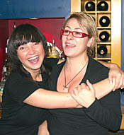 Waitresses Ewelina Wasiewicz, from Poland and Greek Vassiliki Vrioni, at Caf&eacute; Corfu