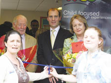 Karen Buck MP, Sidney Wright, chairman of the board of trustees Peter Calderbank and Lord Mayor of Westminster Carolyn Keen at the opening ceremony. Pictured cutting the ribbon are Angela Tough and Harri Dixon who both attended the centre as children.