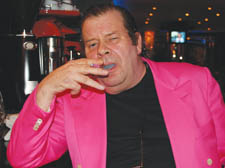 Dave West, who owns Abracadabra in Jermyn Street, enjoys a smoke in his club 