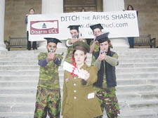 University College London students wear military uniform to protest against the college's investment