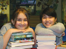 Monica Maljoku and Vincci Chong's school is awash with books.