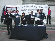 UCL students posing as international arms dealers during the protest.