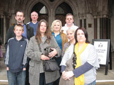 At the High Court on Wednesday: Back row, from left: Padraic Finn, John Brennan, Gary Kirk; front row, from left: Thomas Finn (pupil), Georgina Schueller and Alyson Moore (parents), Anthea Masey (ex-governor) and Bridget Chapman