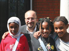 Faith to faith: Rabbi Jeremy Gordon with children from the Adventure Playground and Salusbury World Refugee Centre yesterday (Thursday). From left: Shamhaan Ahmed, Monia Elmakkauoi and Razan Abdelmagid, all aged 9.      