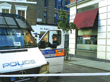 Police outside Le Cordon Bleu after a trainee chef sparked a safety alert