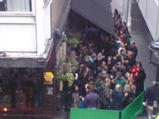 A large crowd of al fresco drinkers at The Endurance bar, in Soho