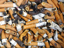 Big companies leave cigarette mess