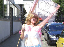 Student Fiona Ramford protests near Oxford Street in a transparent outfit