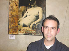 Artist Jon Jones and one of his paintings