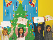 Children at Soho Parish School with their calendar designs 