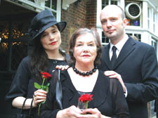 William Hall's widow Jean with the couple's children Juliette and Will on the day of the writer's funeral
