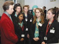 The Princess Royal is pictured talking to Donika Berjani (far right) and fellow students.