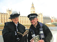 Inspector Danny Lamb and Westminster Libraries officer Catherine Cooke help promote the reading scheme on the Thames