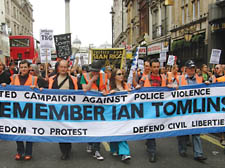 Marchers remember Ian Tomlinson who died in the G20 protests