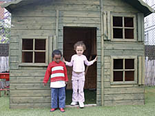 Christian and Emilia at their damaged playhouse