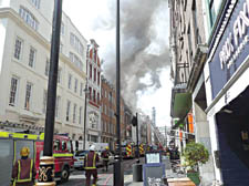 July 10: firefighters at the scene of the Soho blaze
