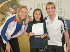 St Joseph RC Primary School pupil Tin Tin Ho, 11, with Olympic rowing bronze medallist Sarah Winckless and diver Leon Taylor, who won a silver medal at the Athens Games in 2004