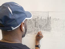Artist Stephen Wiltshire drawing New York from memory