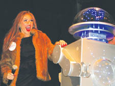 Zoe Salmon flicks the switch, to herald the Marylebone Christmas lights 