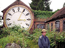 Roland Hoggard with the original clock on which the replica is modelled