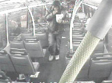 A CCTV image of Anthony Joseph eating chips as he boards the 43 bus 