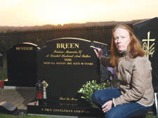 Lorraine Breen by the graveside of murdered husband Tom 